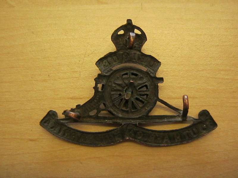 SA Ubique double wheel cap badge